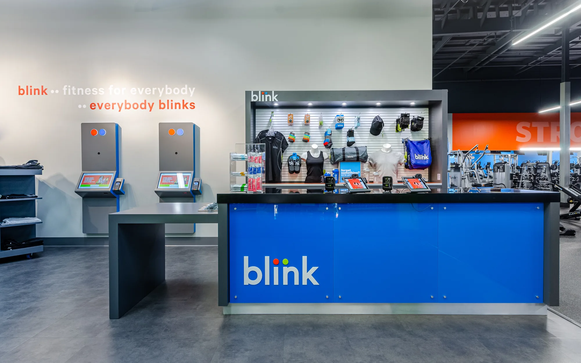 Blink Fitness club photographed by Black Paw Photo in the brand's signature blue and orange