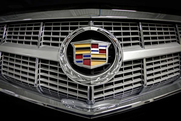 Front three-quarter shot of a sedan positioned for a showroom feature