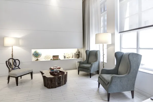 Consultation room with desk and patient seating