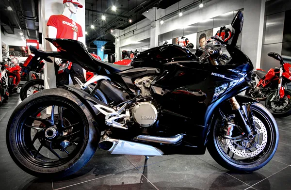 Custom paintwork photographed close on a showroom bike