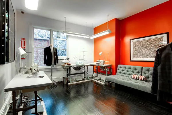 Fitting room corridor with brand graphics