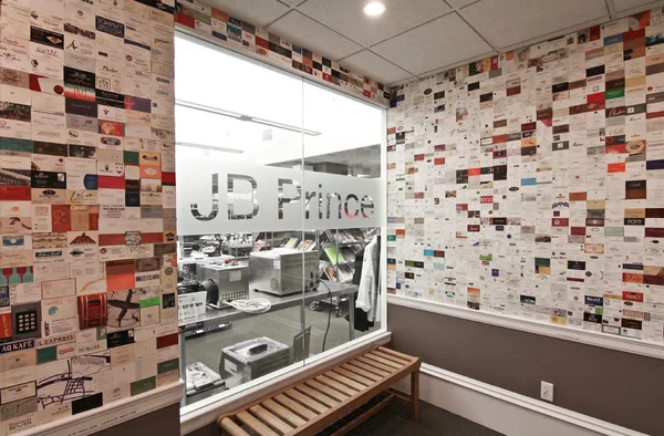 Appliance row photographed along the showroom wall